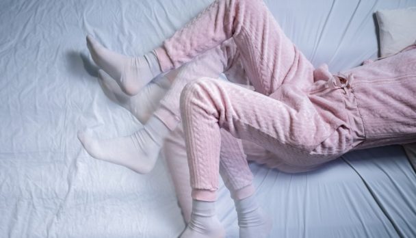 African,American,Woman,With,Rls,-,Restless,Legs,Syndrome.,Sleeping