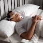 Asian,Man,Sleeping,Calmly,With,Cpap,Nasal,Mask,In,Bed,